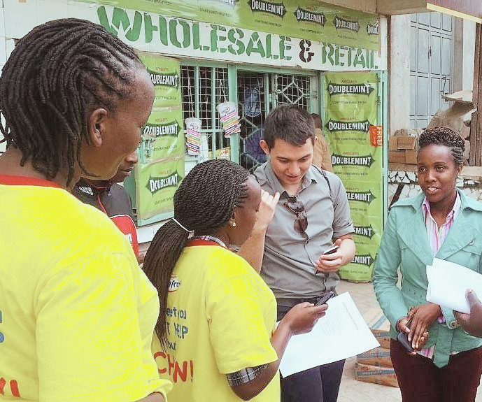 Daniel Yu speaking to Nairobi shopkeepers
