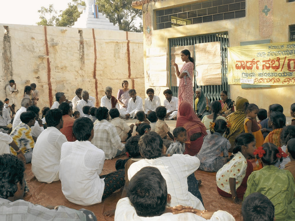 villagers discussing the study questions